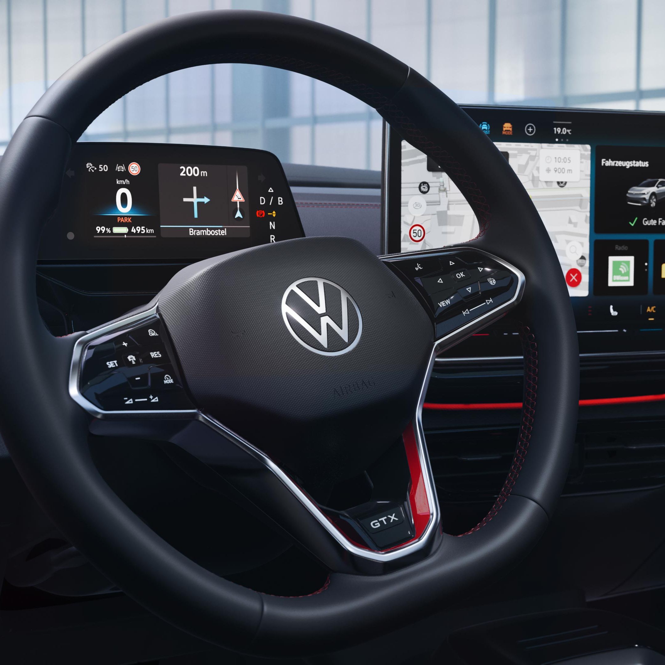 VW ID.4 GTX Interieur. Blick auf das Multifunktionslenkrad und Infotainment-System.